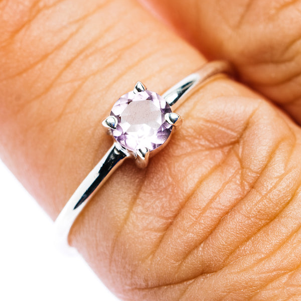 Amethyst gemstone sterling silver ring with round center stone and prong setting