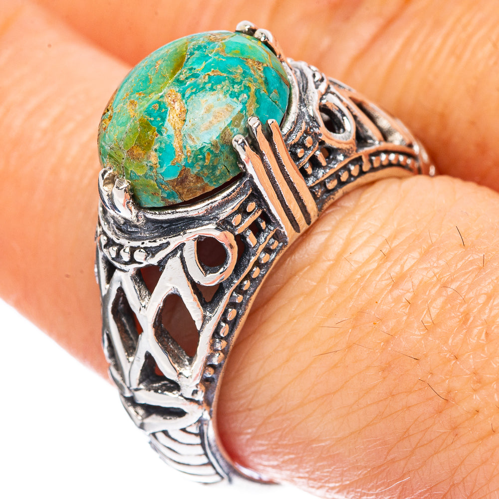 Turquoise cabochon sterling silver ring with ornate cutout design, size 8.5