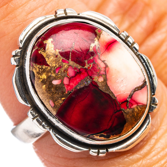 Sterling silver oval cabochon ring with red, pink and gold-inlaid stone top