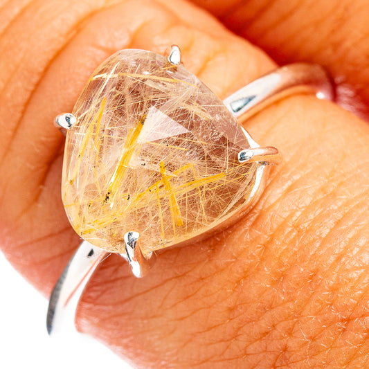 Sterling silver ring with oval faceted rutilated quartz, golden needle inclusions