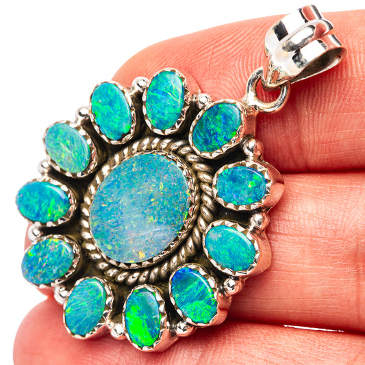 Sterling silver opal doublet pendant, blue-green round center with leaf-like oval stones