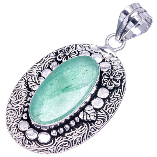 Oval green aventurine pendant with etched German-silver bail and decorative filigree