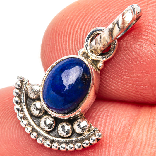 Blue oval lapis lazuli pendant, .925 sterling silver crescent frame and loop bail