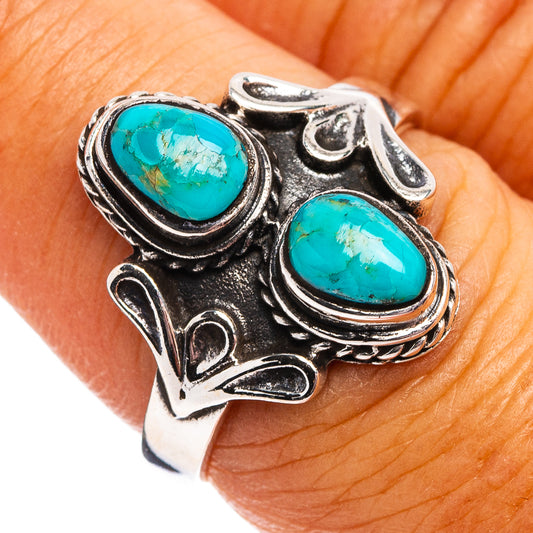 Turquoise oval stone ring in .925 sterling silver with ornate braided-style setting