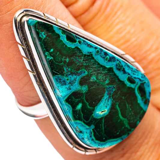 Sterling silver ring with oval green-blue marbled stone, bezel setting.