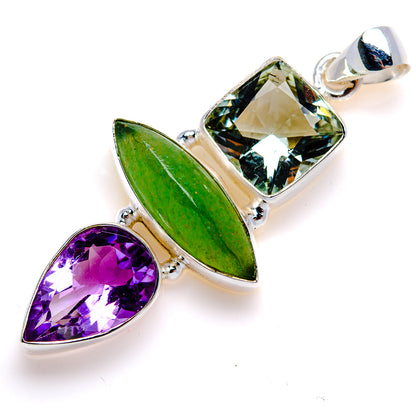 Sterling silver pendant with green marquise and purple pear faceted stones, square center