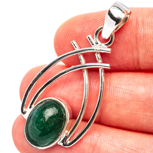 Sterling silver emerald pendant with oval green cabochon and curved arc design