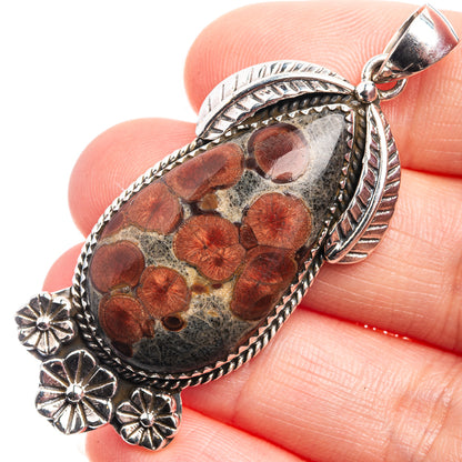 Sterling silver teardrop jasper pendant with red flower pattern and ornate edge
