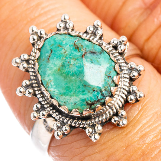 Turquoise gemstone ring with ornate sterling silver setting, size 7.25