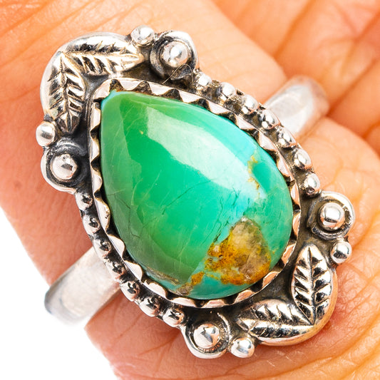 Sterling silver ring with oval turquoise cabochon and leafy bezel, size 6.75