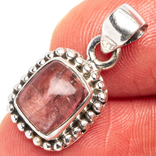 Sterling silver pendant with pink tourmaline gemstone in bezel and rope border