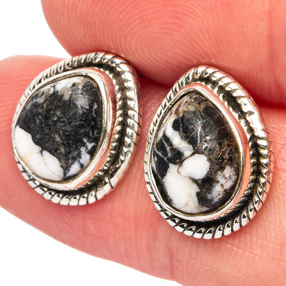 Oval black-and-blue stone drop earrings with rope bezel in .925 sterling silver