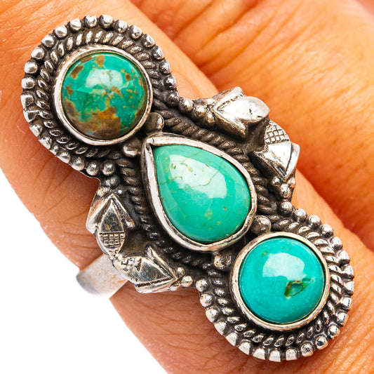 Turquoise oval-stone adjustable sterling silver ring with ornate beadwork and arrow details