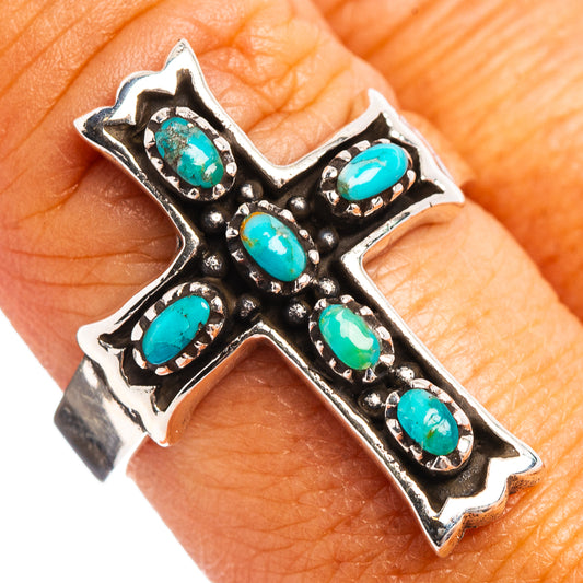 Turquoise cross ring showing oval stones and black antiqued silver on band