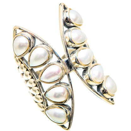 Sterling silver hoop-style ring with multiple white cultured pearls in crisscross frame