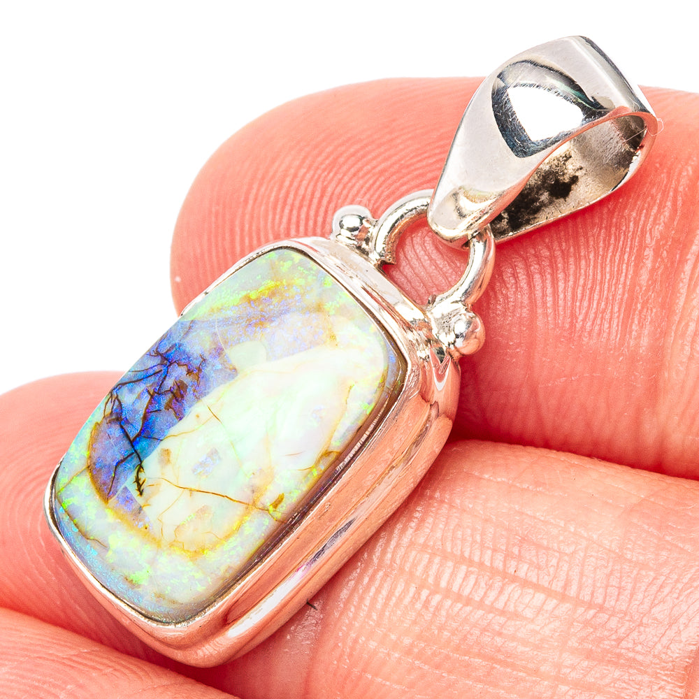 Sterling silver opal pendant with rectangular iridescent stone and open bail loop