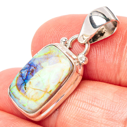 Sterling silver opal pendant with rectangular iridescent stone and open bail loop