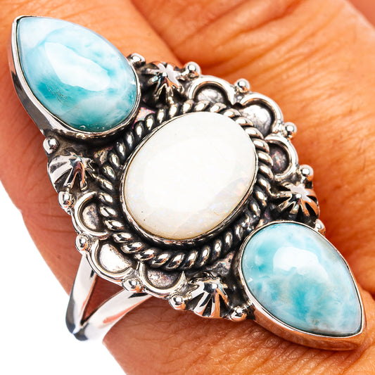 Sterling silver ornate ring, three oval stones: blue and white, size 10.