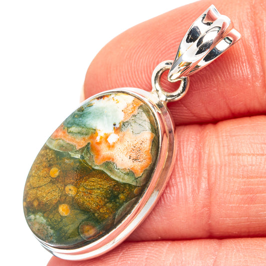 925 sterling silver rhyolite pendant with oval cabochon, green and orange mottled stone