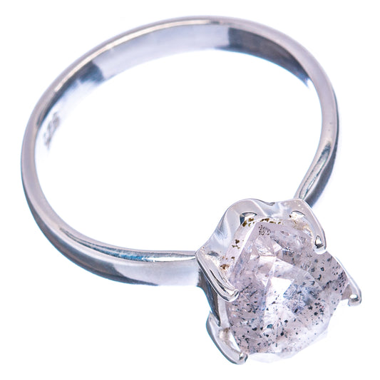 Sterling silver ring with faceted clear tourmalinated quartz oval center stone
