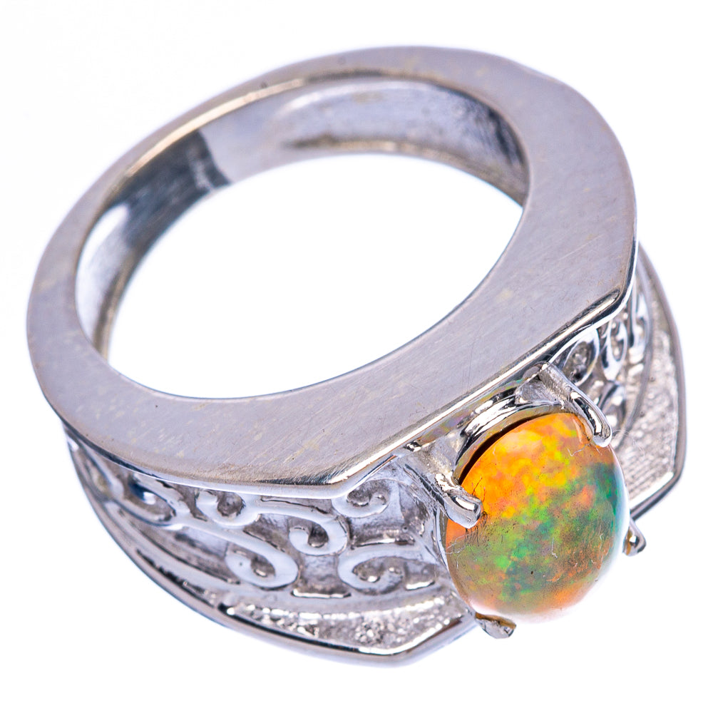 Sterling silver opal ring with oval cabochon, ornate carved band