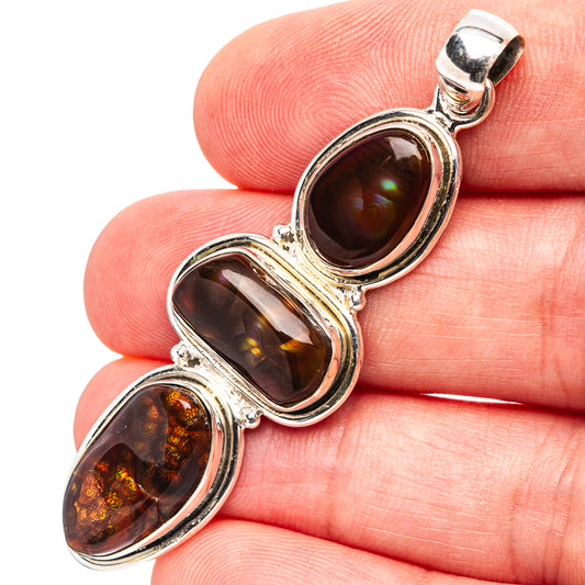 Fire agate pendant in 925 sterling silver with three oval cabochons and bail