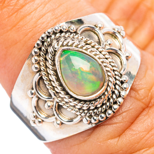 Sterling silver oval opal ring with ornate rope setting, size 6.5