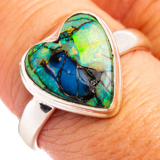 Heart-shaped opal cabochon sterling silver ring with blue-green iridescence, size 9