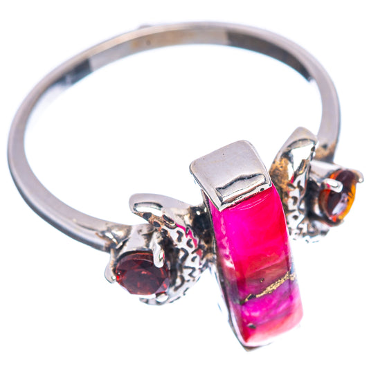 Sterling silver ring with pink rectangular centerpiece, red garnet accents, silver filigree band