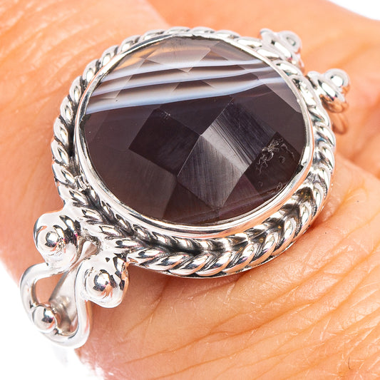 Sterling silver ring with oval Botswana agate, dark smoky purple stone in ornate bezel