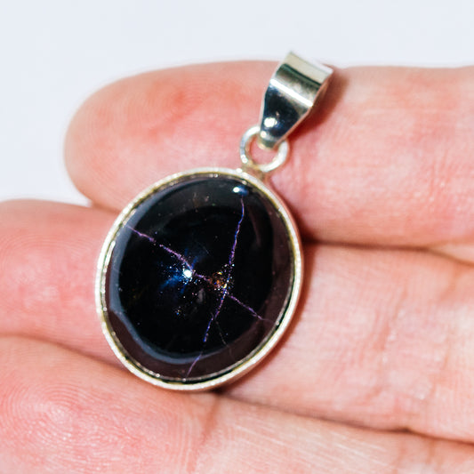 Round star garnet pendant, .925 sterling silver bezel and loop bail
