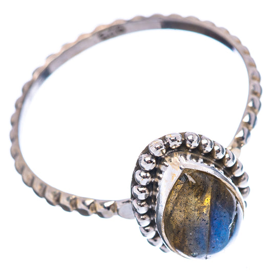Sterling silver dainty labradorite ring with oval bezel and bead-set band