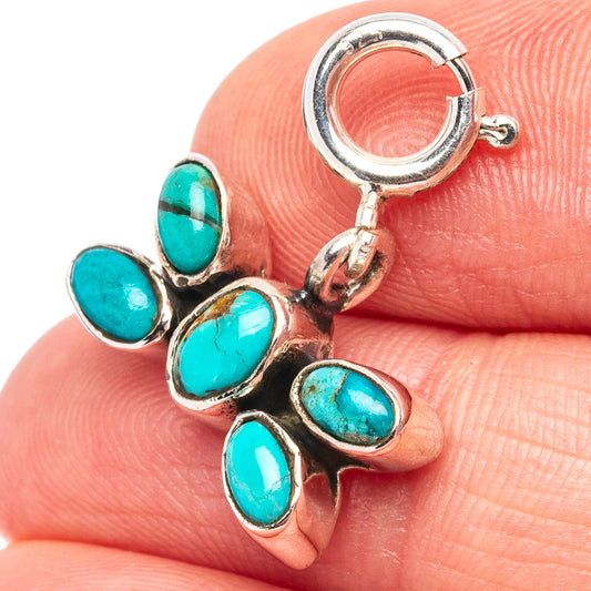 Turquoise oval pendant on .925 sterling silver bail, close-up of multi-stone setting