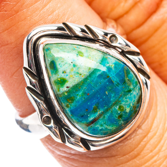 Sterling silver oval opal ring with ornate leaf setting, blue-green gemstone
