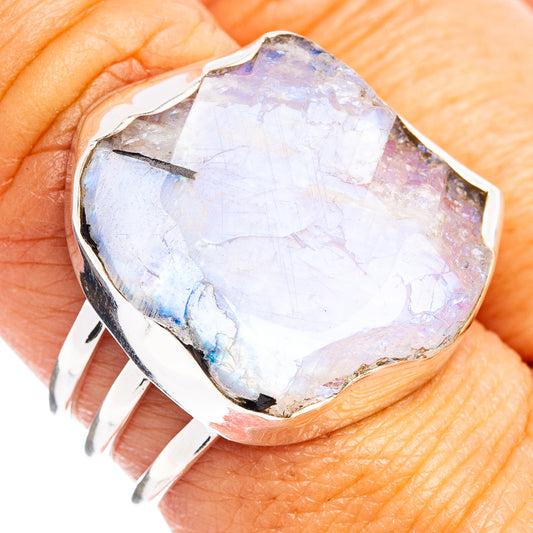 Sterling silver ring with large oval rainbow moonstone, raised bezel setting