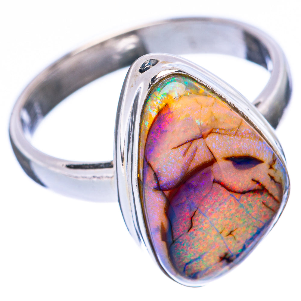 Sterling silver ring showing oval opal with purple and rainbow flashes