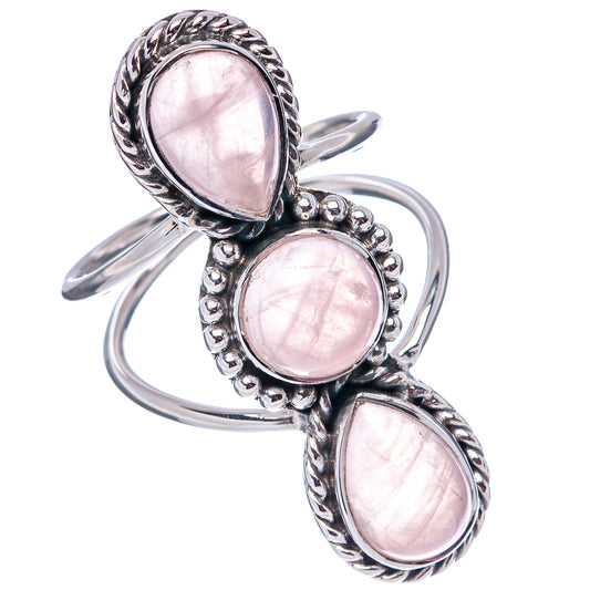 Sterling silver ring with three rose quartz cabochon ovals on a twisted silver band