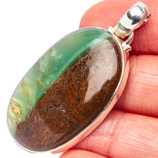 Chrysoprase stone pendant in .925 sterling silver, oval with green and brown matrix.