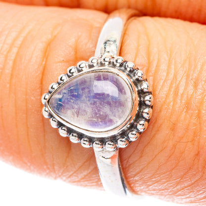 Sterling silver dainty ring with oval purple moonstone cabochon and beaded halo