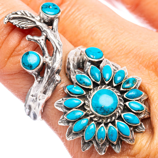 Turquoise flower ring on hand, blue cabochon stones in silver leaf-like petals