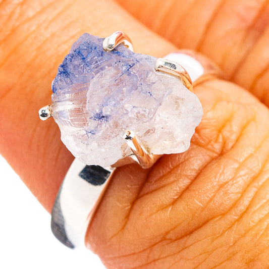 Sterling silver ring with faceted blue quartz crystal centerpiece, open prongs
