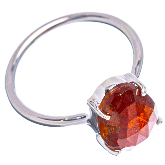 Orange kyanite ring, .925 sterling silver band with faceted orange-red stone in bezel