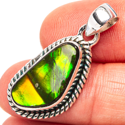 Ammolite pendant in sterling silver with oval green-gold iridescent stone and bail