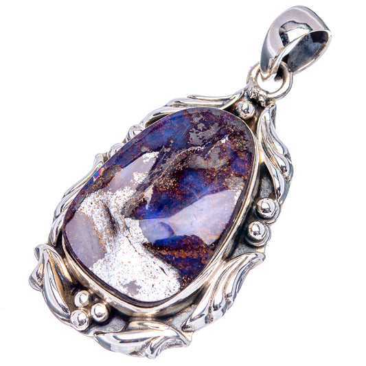 Sterling silver boulder opal pendant, oval dark blue stone in raised decorative frame