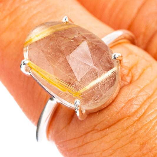 Rutilated quartz faceted ring with oval stone, yellow needle inclusions in sterling silver