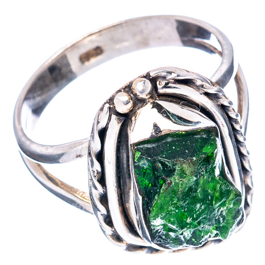 Sterling silver ring with rough-cut green diopside, raised bezel and scrollwork