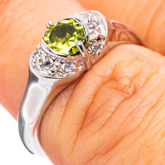 Sterling silver peridot cubic zirconia ring with oval green stone, prong setting