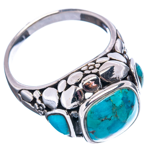 Turquoise oval sterling silver ring with carved details and side turquoise stones