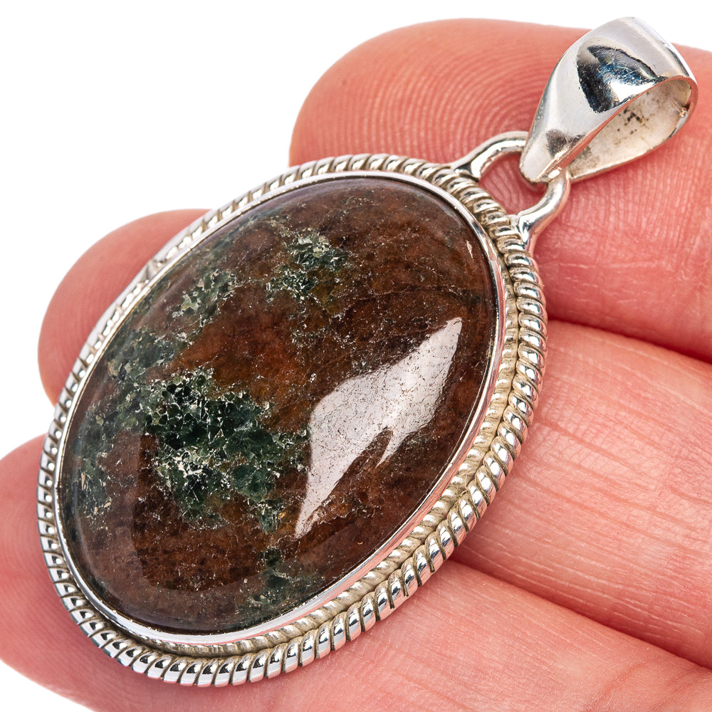 Sterling silver oval pendant with green-brown marbled gemstone cabochon