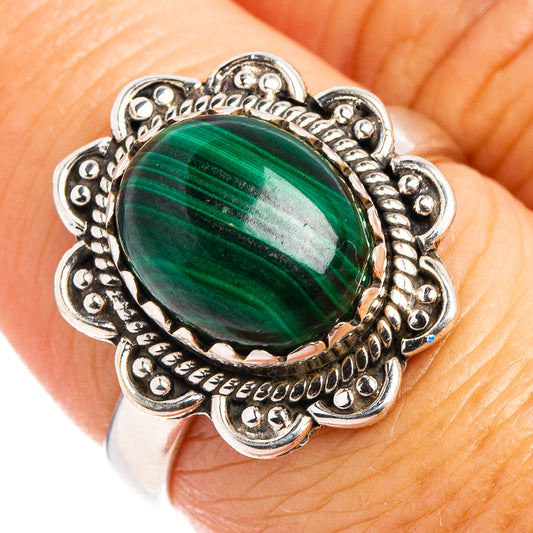 Size 7 malachite ring in .925 sterling silver with oval green stone